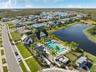Resort style community clubhouse with a community pool, fitness center and lake front pool.
