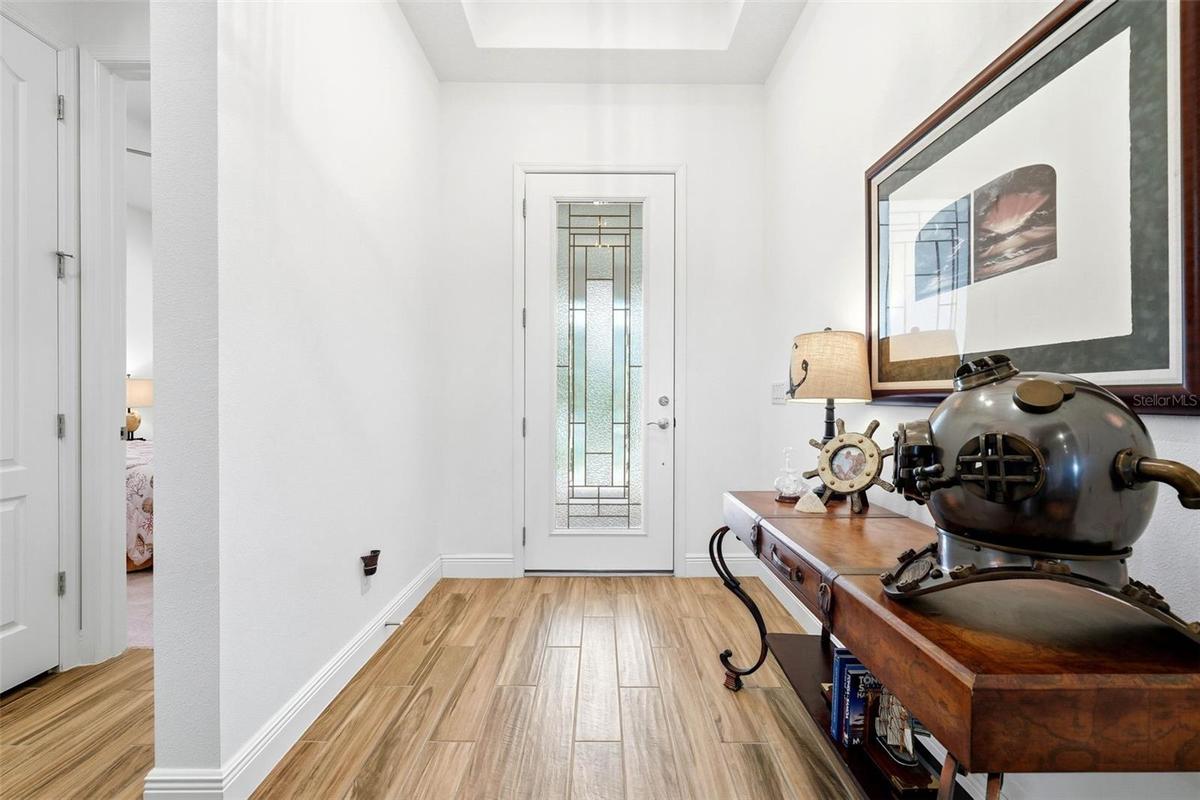Step into a spacious entry with a beautiful tray ceiling—welcoming from the moment you arrive!