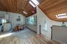 Dinning Room with Tile & Natural wood flooring, Built in's and Skylights