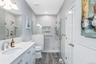 Contemporary Primary bathroom featuring a spacious glass-enclosed shower