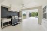 4000 sq ft lanai with covered areas, bar, & outdoor kitchen