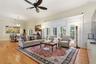 THIS FAMILY ROOM EXPANDS INTO THE OUTSIDE AREA WITH FRENCH DOORS