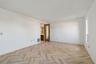 Primary bedroom with door to ensuite bath