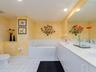 Primary Double vanity and jacuzzi tub