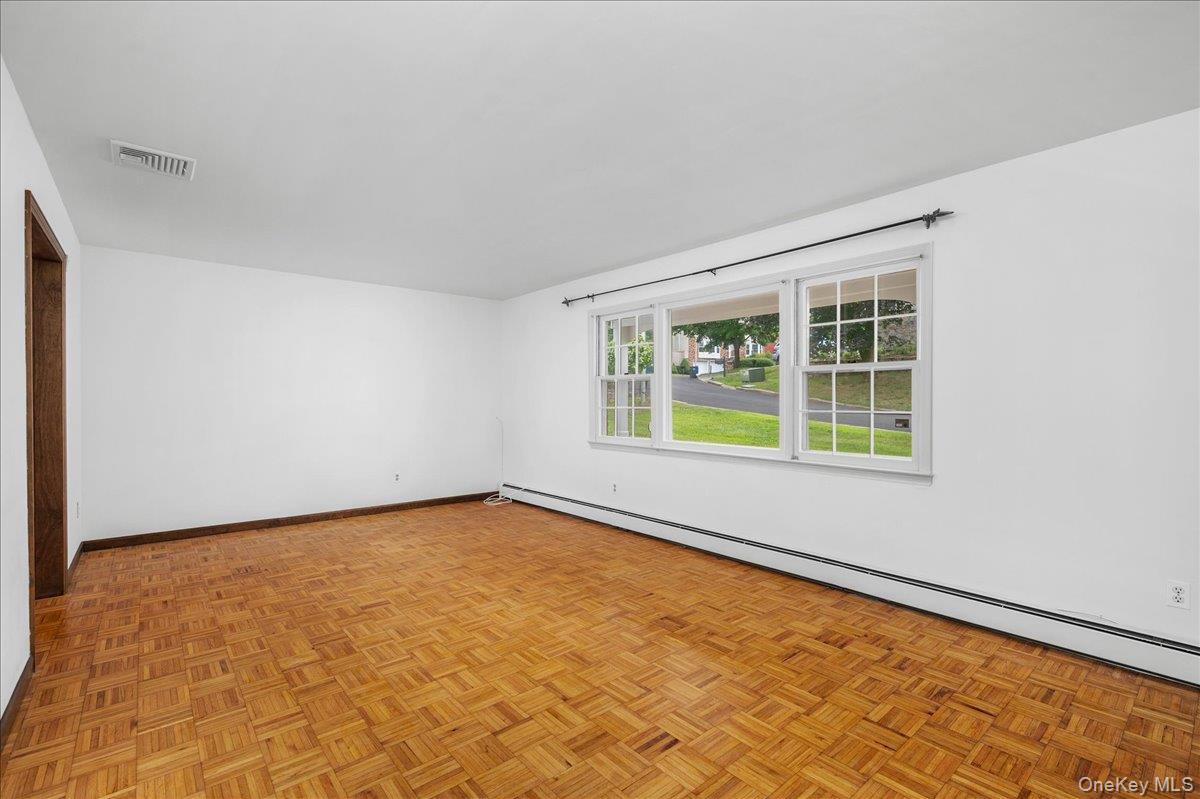 Bright Living Room Flows to Formal Dining Room
