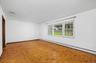 Bright Living Room Flows to Formal Dining Room