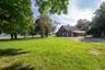 Large backyard in front of the barn.