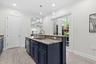 Hurricane rated French Doors lead to outdoor living space.