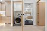 Laundry room featuring washer / dryer and baseboards