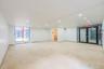 Unfurnished room featuring unfinished concrete flooring and recessed lighting