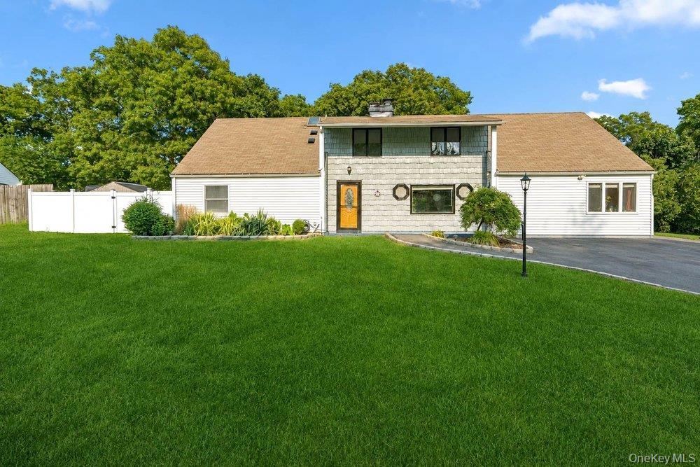 Large Colonial with 5 Bedrooms and 3 Baths on 1/3 acre.