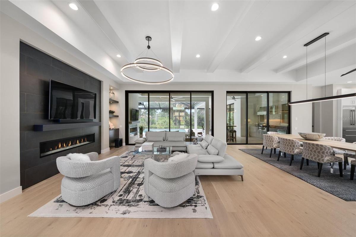 The expansive great room serves as a stunning focal point for the home with soaring 13-foot ceilings.