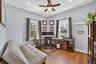 Sun-drenched second bedroom with beautiful natural light throughout.