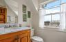Half bath with toilet and vanity