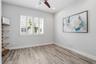 Flex room off the main living floor that is ideal for a home office or guest room
