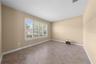 Formal living room, piano room, or flex space.
