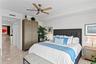 Primary Bedroom with Ensuite, Walk-in closet, and open water views of Tampa Bay