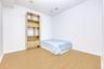 Office with wood finished floors and baseboards
