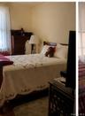 one of 6 large bedrooms