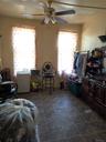 Bedroom featuring a ceiling fan