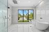 Luxury Bathtub and Dramatic Ceiling-Mounted Tub Filler