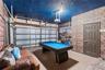 Garage has been converted into a semi play area.