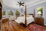 Primary bedroom with bamboo flooring