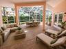Virtually staged patio with full screened birdcage