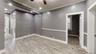Unfurnished room with ceiling fan and light wood-type flooring