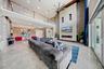 Soaring ceilings give this main living space a bright, open and airy ambiance
