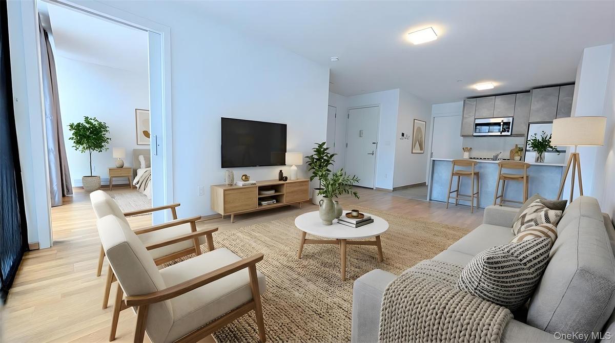 Living area featuring light wood finished floors