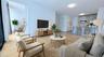 Living area featuring light wood finished floors