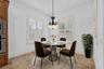 Virtually Staged. Cozy Breakfast Nook overlooking the backyard and pool area