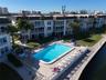 The unit is very close to one of the three pools in development.