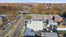 View of property location with nearby urban area