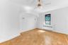 1st bedroom on upper level with inset alcove for bed