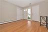 Entry Foyer, Door leads to two car garage, stairs lead to finished lower level