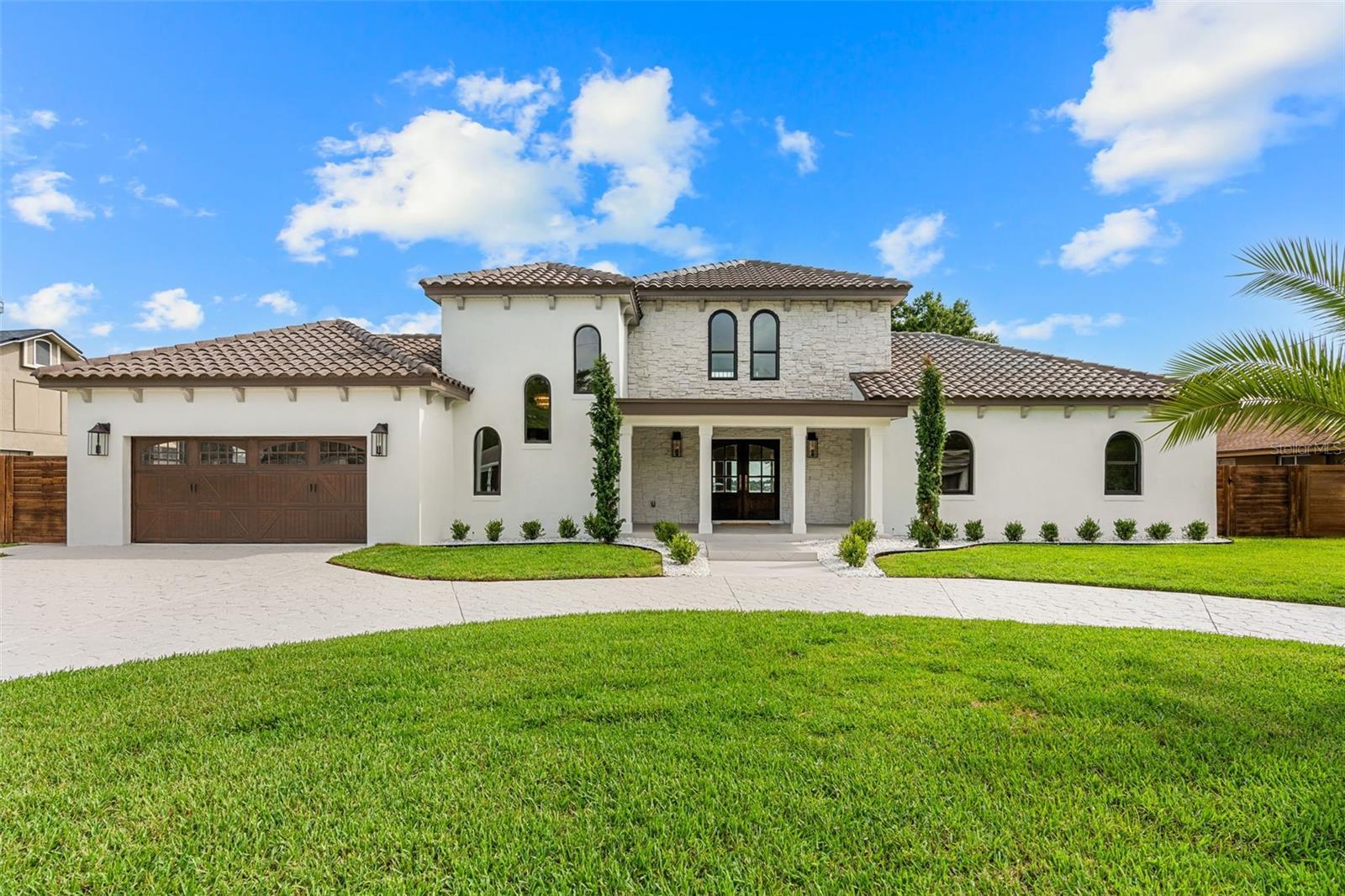 IMPRESSIVE FRONT ELEVATION SHOWCASING THE ESTATE