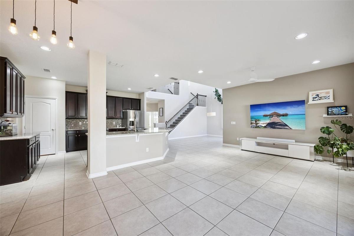 Tiled great room is open to the kitchen
