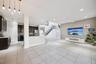 Tiled great room is open to the kitchen