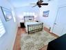 Primary Suite with high ceilings and plantation shutters