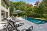 Swimming pool featuring a deck and outdoor dining space