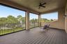 Large Covered Balcony with Electric Screens