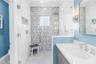 Seamless Shower with Floor to Ceiling Designer Tile
