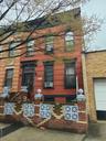 View of front facade with brick siding