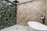 You never have to worry about the floor getting wet in this bathroom. In fact, it's encouraged. Suds in the tub and rinse in the shower.