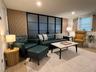 Living room featuring light wood-style flooring and recessed lighting