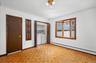 Flexible First Level Space for use as Den/Office/Guest Room and  Laundry Closet