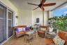 Complete with an outdoor fan and plants for privacy