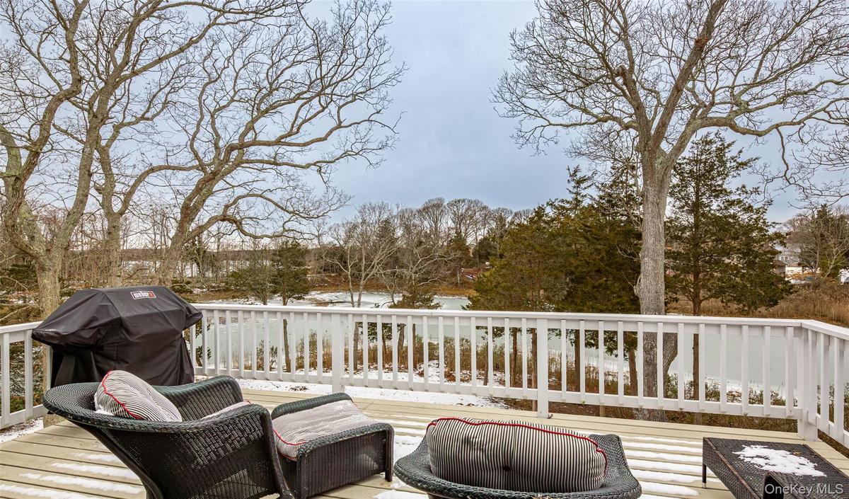 Wooden deck with a grill